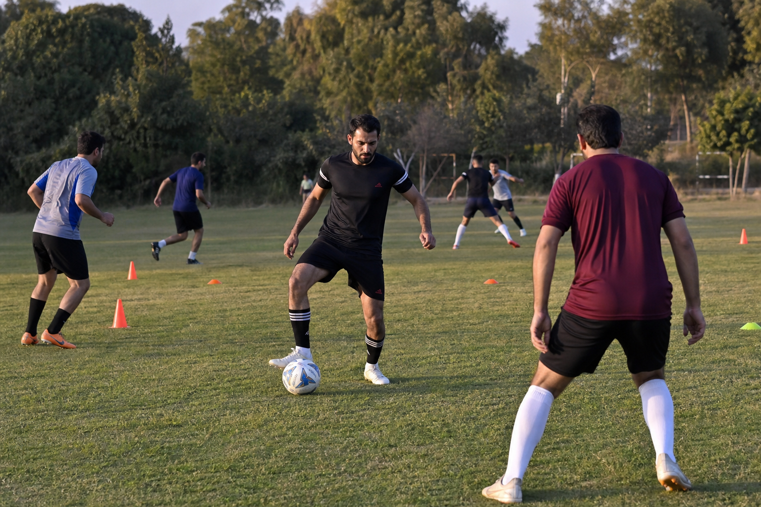 Football team warming up on a ground in Islamabad